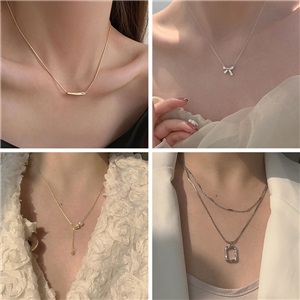 Heart-moving model~ spring and summer white and white combination ins high-end necklace female light luxury bowknot niche design clavicle chain