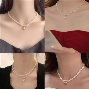 Millet Glass Pearl Twist Necklace Beads High-end Sense Minority Light Luxury Women's Necklace Clavicle Chain Net Red Explosion Wholesale